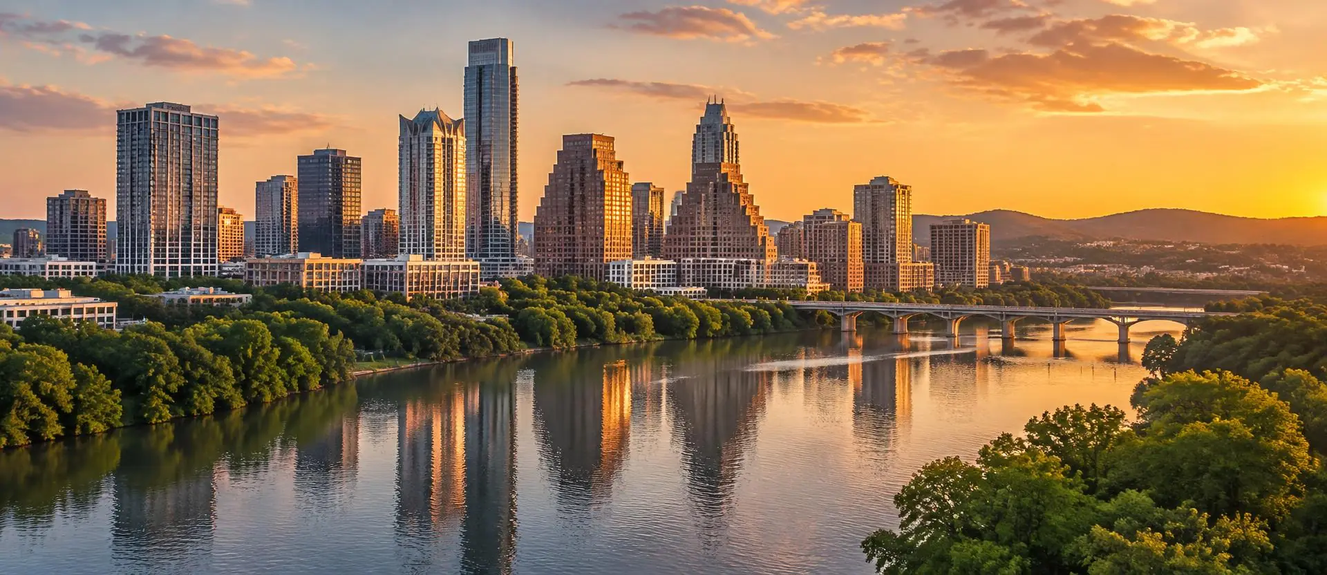 Austin skyline over Lady Bird Lake with Hill Country hills at golden hour